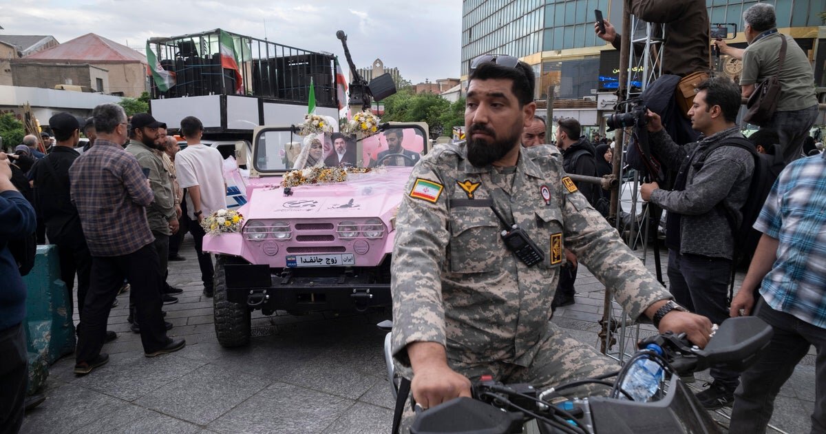 Iran stages mass weddings for couples said to have volunteered for "self-sacrifice" in war with U.S. - CBS News