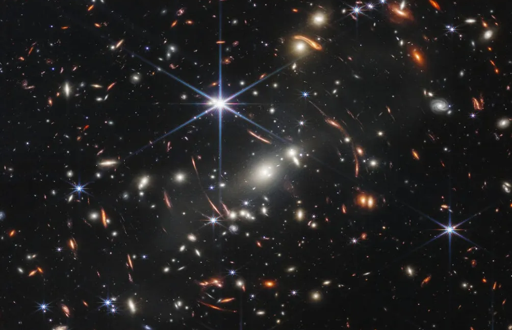 Gravitational lens shows a galaxy just 800 million years post-Big Bang - Ars Technica