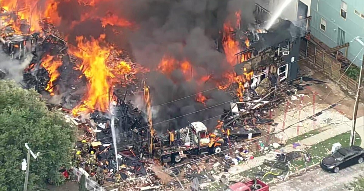 At least 3 dead, 5 hurt after large explosion destroys Dallas apartment building, officials say - CBS News
