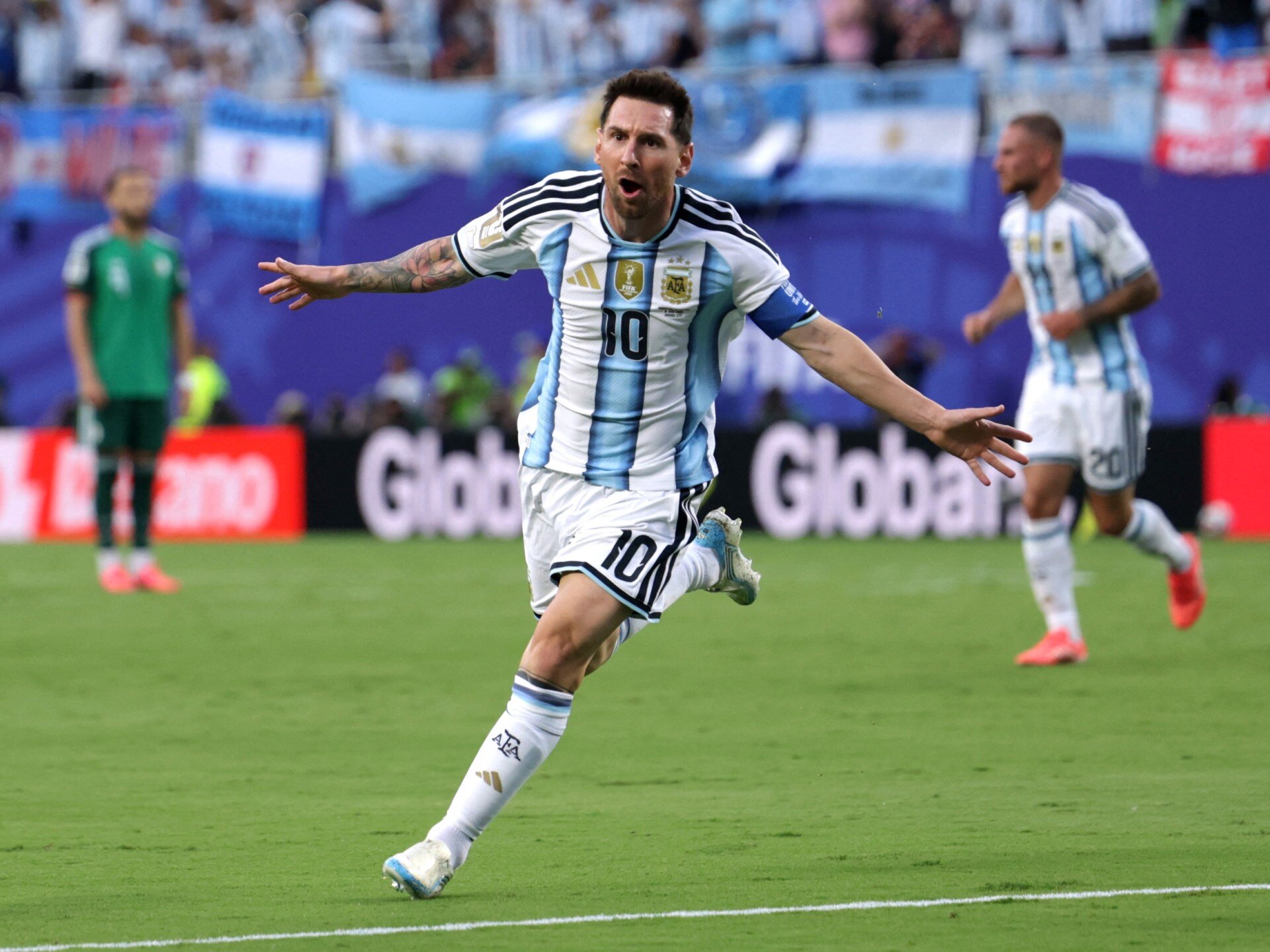 Messi hat-trick fires holders Argentina to win over Algeria at World Cup - Al Jazeera