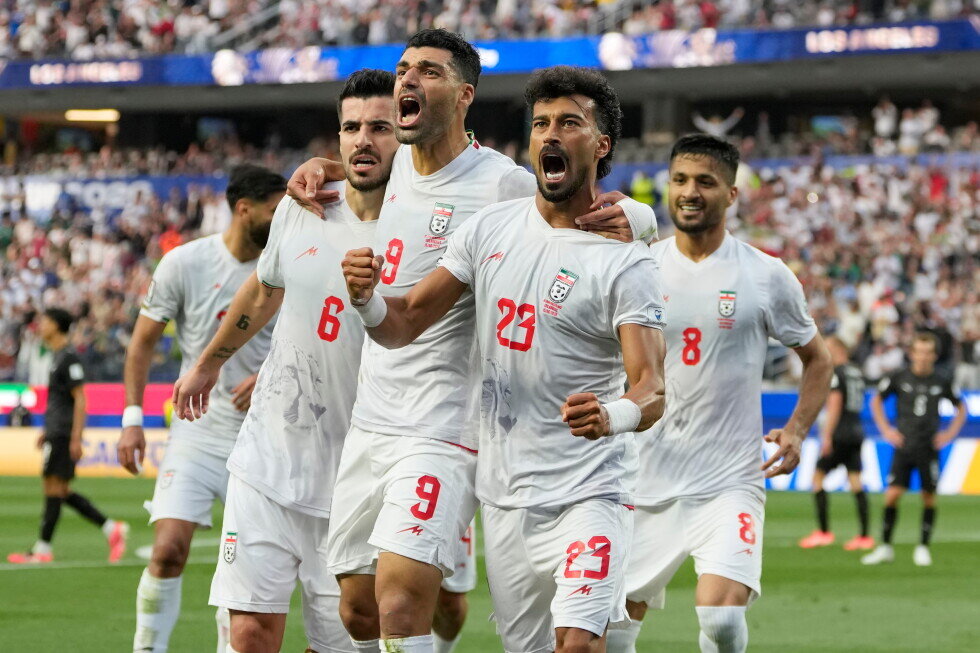 Iran opens a politically charged World Cup by playing to a 2-2 draw with New Zealand - AP News