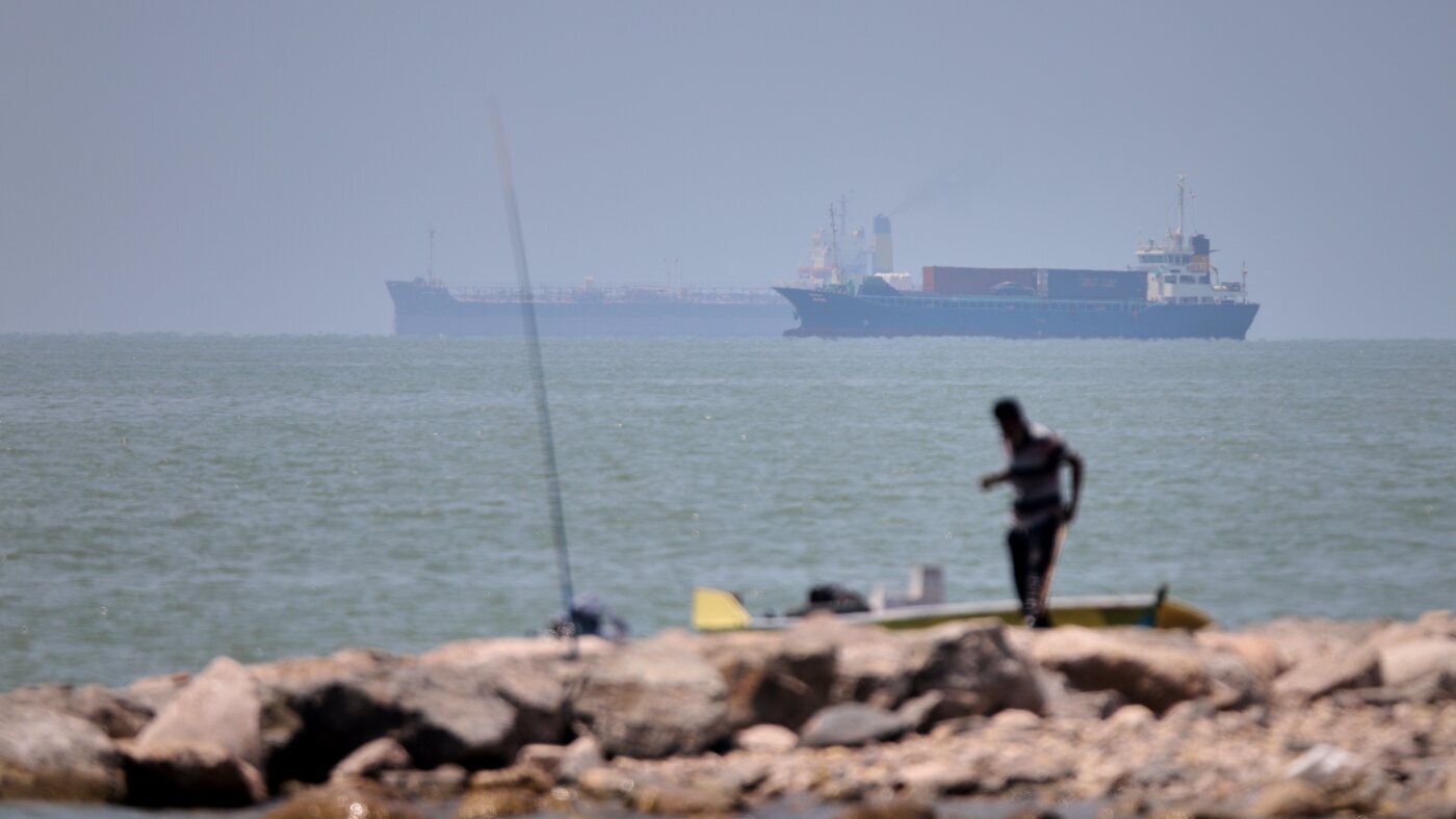 UN agency pauses evacuation of ships through the Strait of Hormuz after attack on vessel - NPR