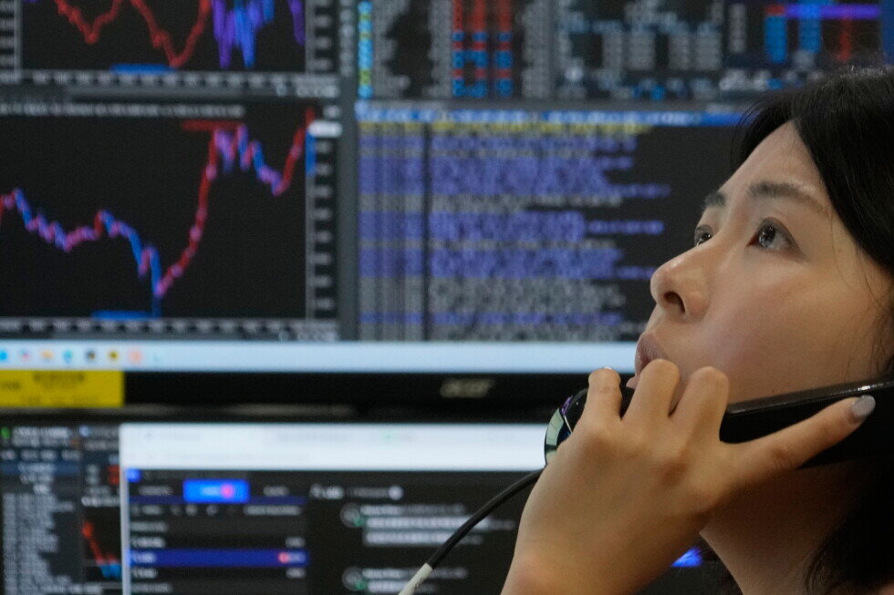 Japan, South Korea stocks hit more records, as oil gains on Iran war ending fragility - AP News