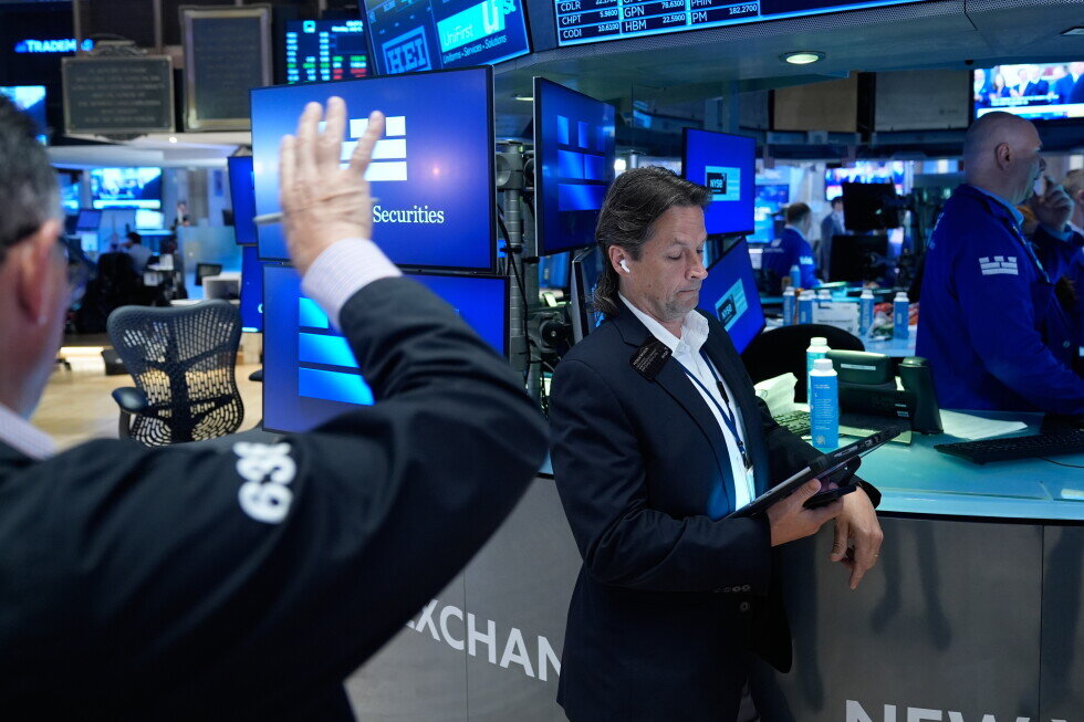 US stocks hold steadier after inflation data, even as IBM plunges - AP News