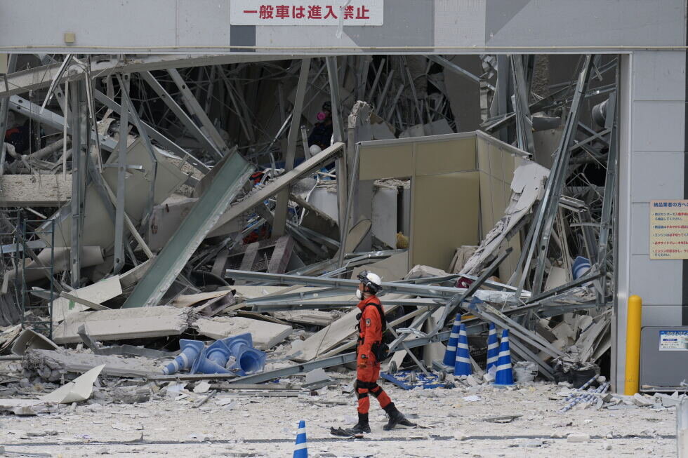 Rescuers search for survivors after a 7.1 quake kills 18 in southwestern Japan - AP News