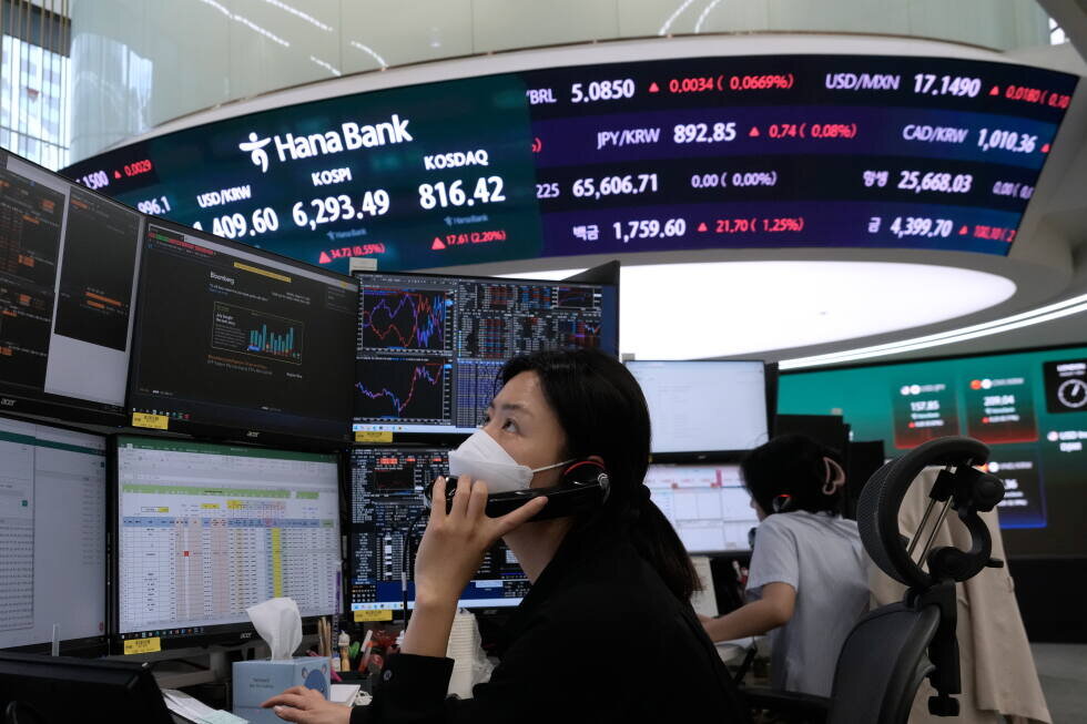 Asian shares are mixed after gains on Wall Street, while oil prices climb - AP News