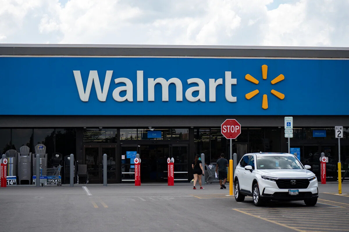 Walmart raises guidance, but the stock drops on slower sales growth - Yahoo Finance