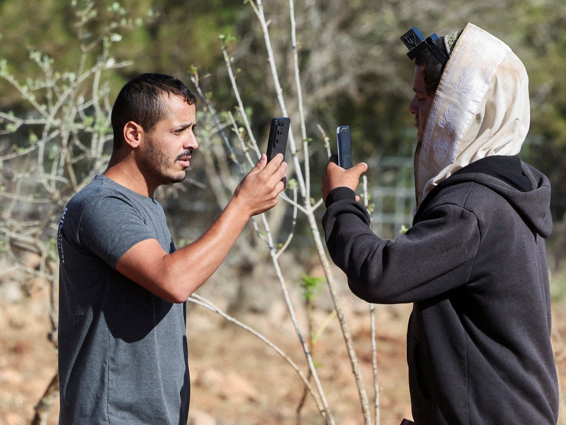 Israeli settlers surround Palestinian home in occupied West Bank’s Qusra - Al Jazeera