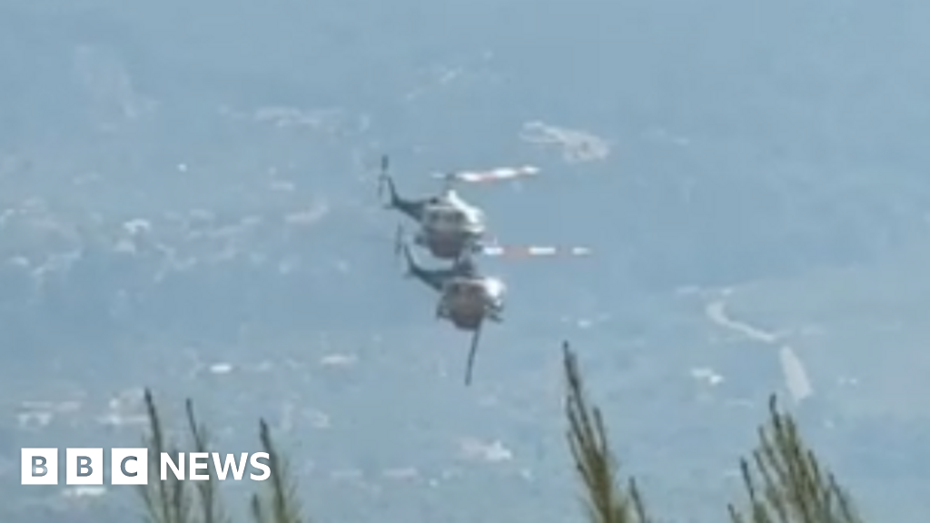 Helicopters fighting Greece wildfires collide in mid-air - BBC