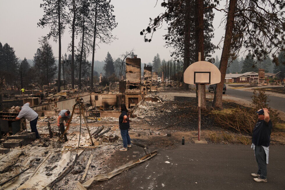 Man charged with setting Spokane’s largest wildfire went to prison for killing his father - AP News