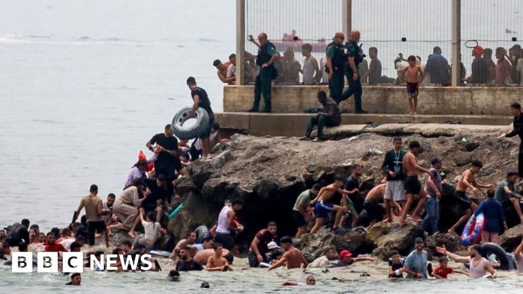 EU calls emergency meeting to discuss Ceuta migrant crossings - BBC