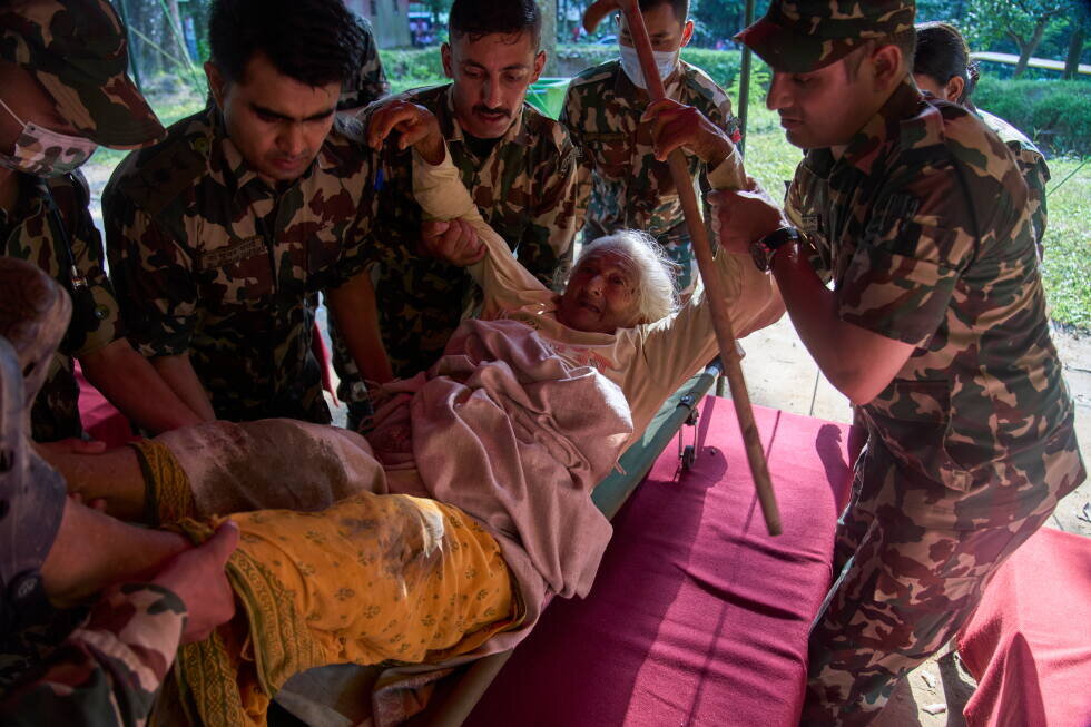 Death toll rises in Nepal-China border disaster as lake poses new flood threat - AP News