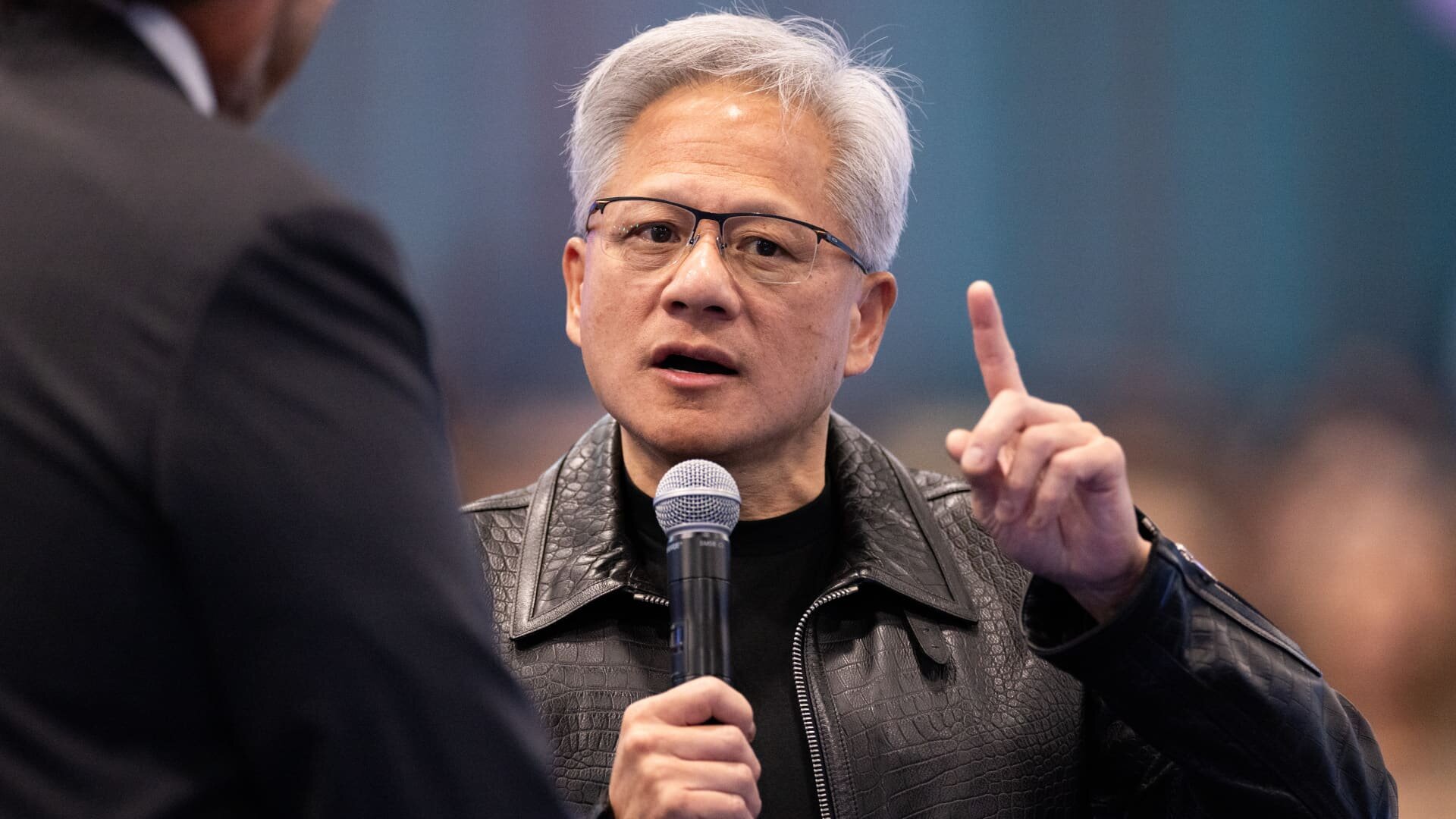 Nvidia CEO Jensen Huang emerges as Trump's top ally in AI safety debate - CNBC