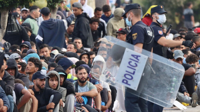 Spain demands answers as police blame Morocco for migrant crisis - Financial Times