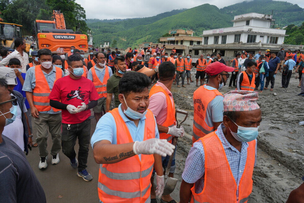 Hundreds of workers feared stuck in hydropower tunnels as Nepal flood deaths cross 900 - AP News