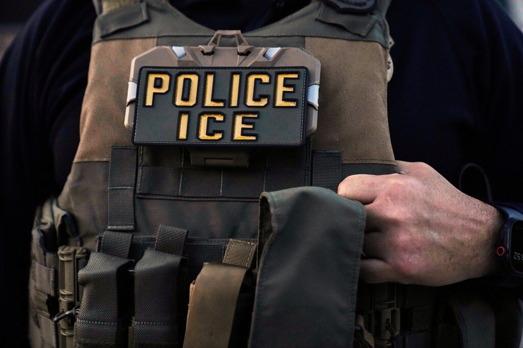 ICE officer charged with lying about shooting turns himself in: Reports - The Hill