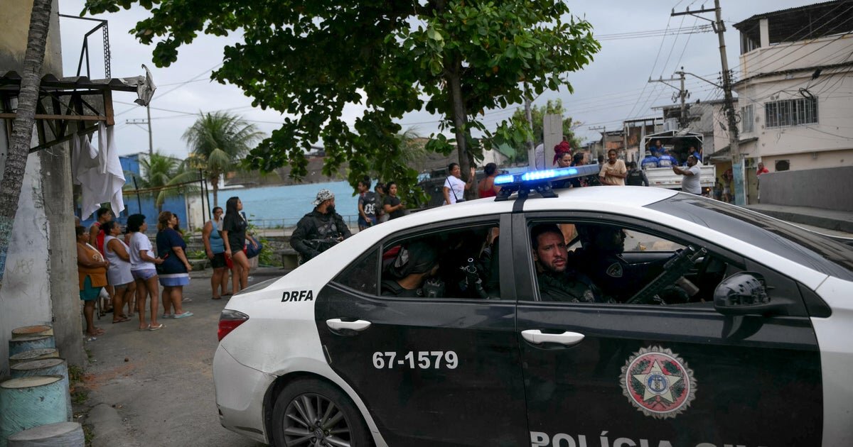 Police capture suspected serial killer disguised as woman, carrying baby in Brazil - CBS News
