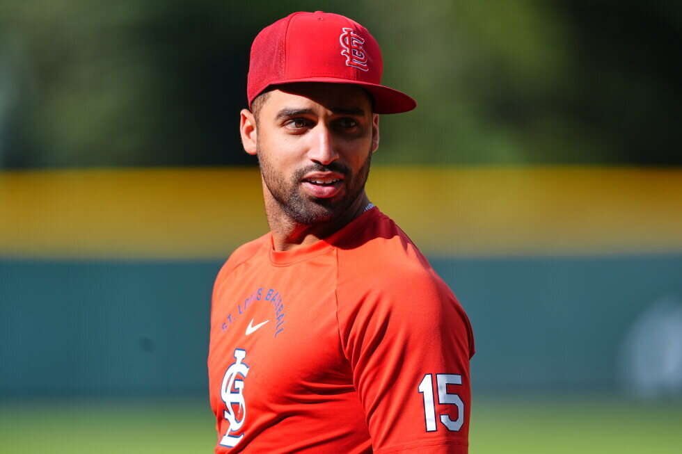 Cardinals, Rockies players tilt caps a day after umpire Eddings' comments to St. Louis rookie - AP News