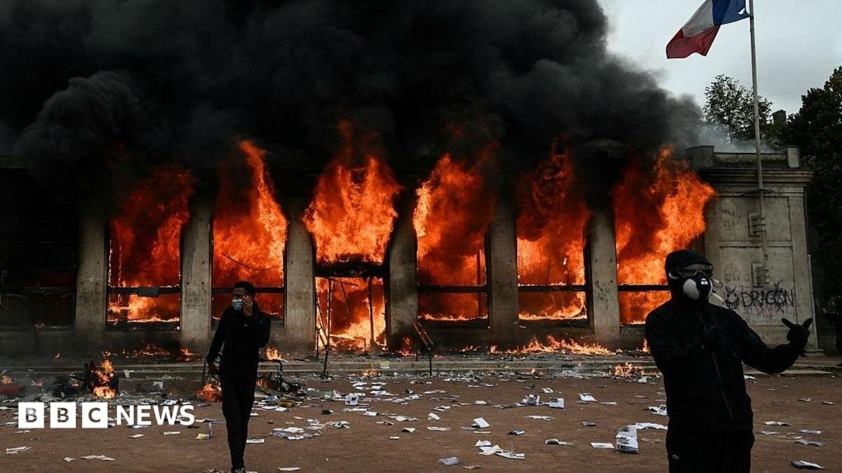 Protesters clash with police in Paris and across France during major day of demonstrations - BBC